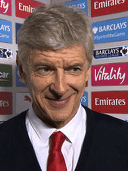 Arsene Wenger currently looks like the cat who got the cream, the tuna and the mouse to play with